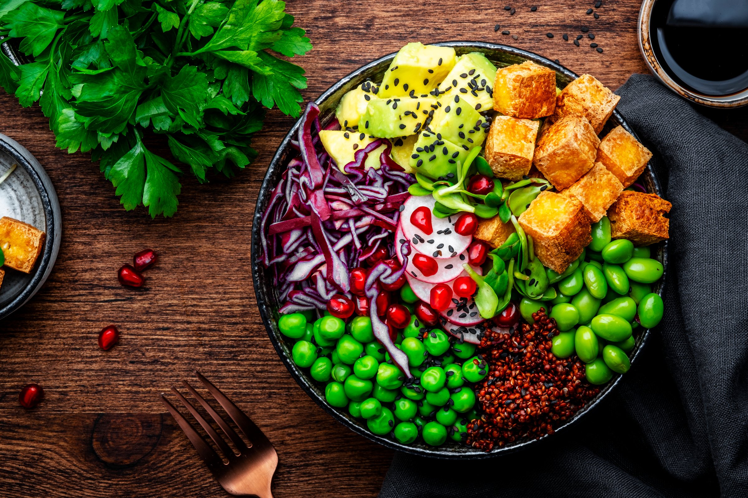 Vegan Buddha Bowl for balanced diet with tofu, quinoa, vegetables and legumes