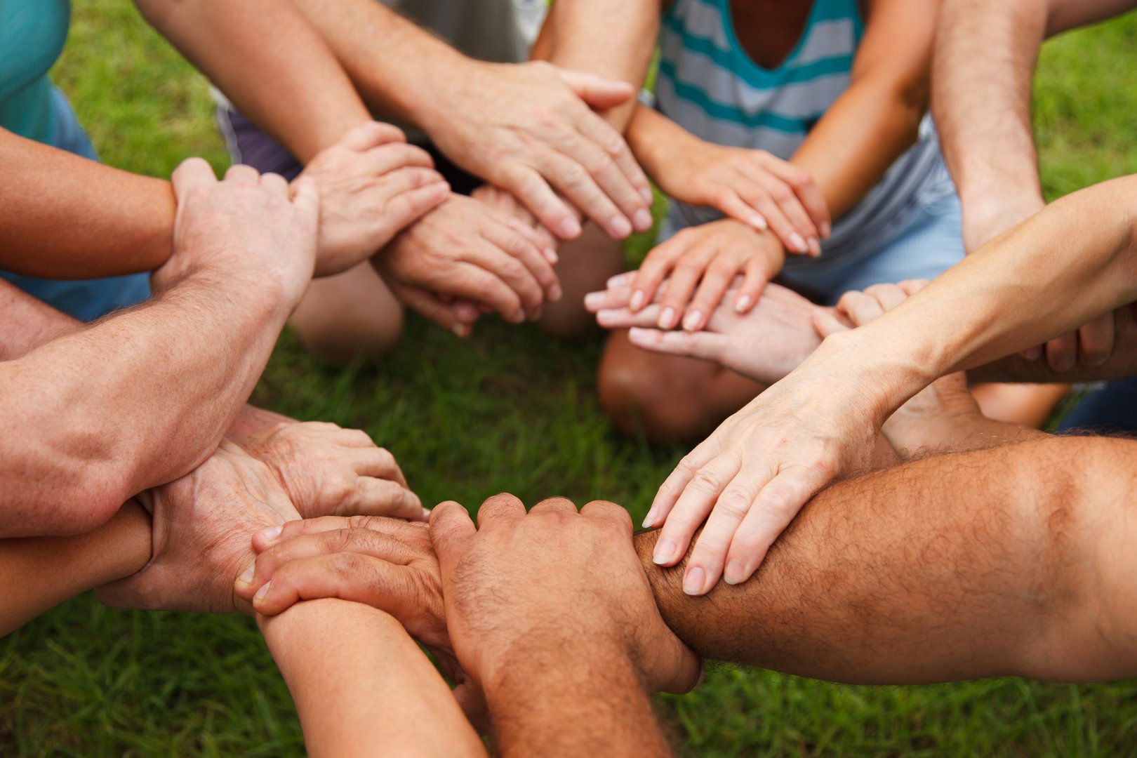 Stack of hands - real people agreement