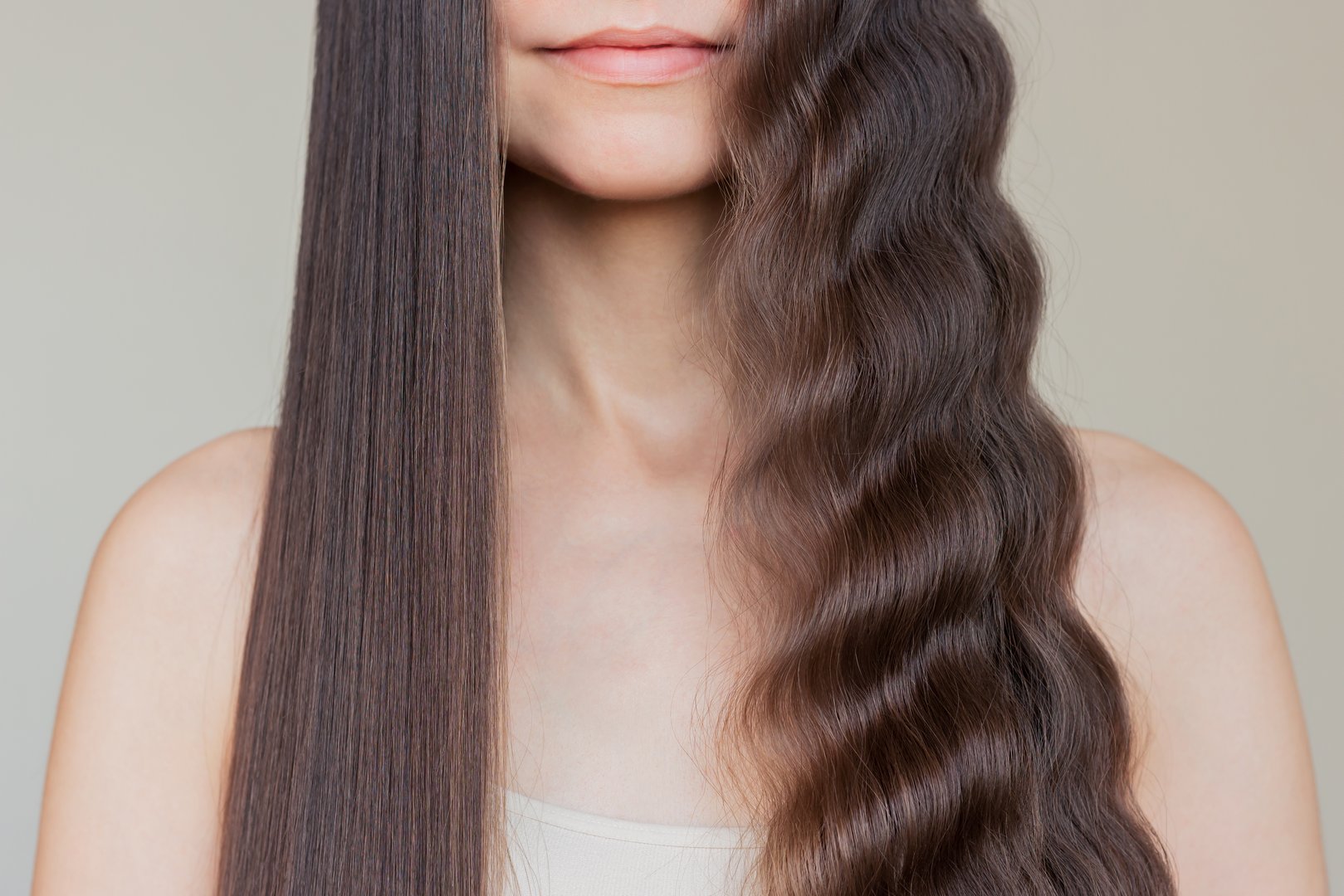 Close-up portrait of pretty young caucasian brunette woman with long, smooth, beautifull, groomed, healthy straight and wavy hair before and after using a curling iron