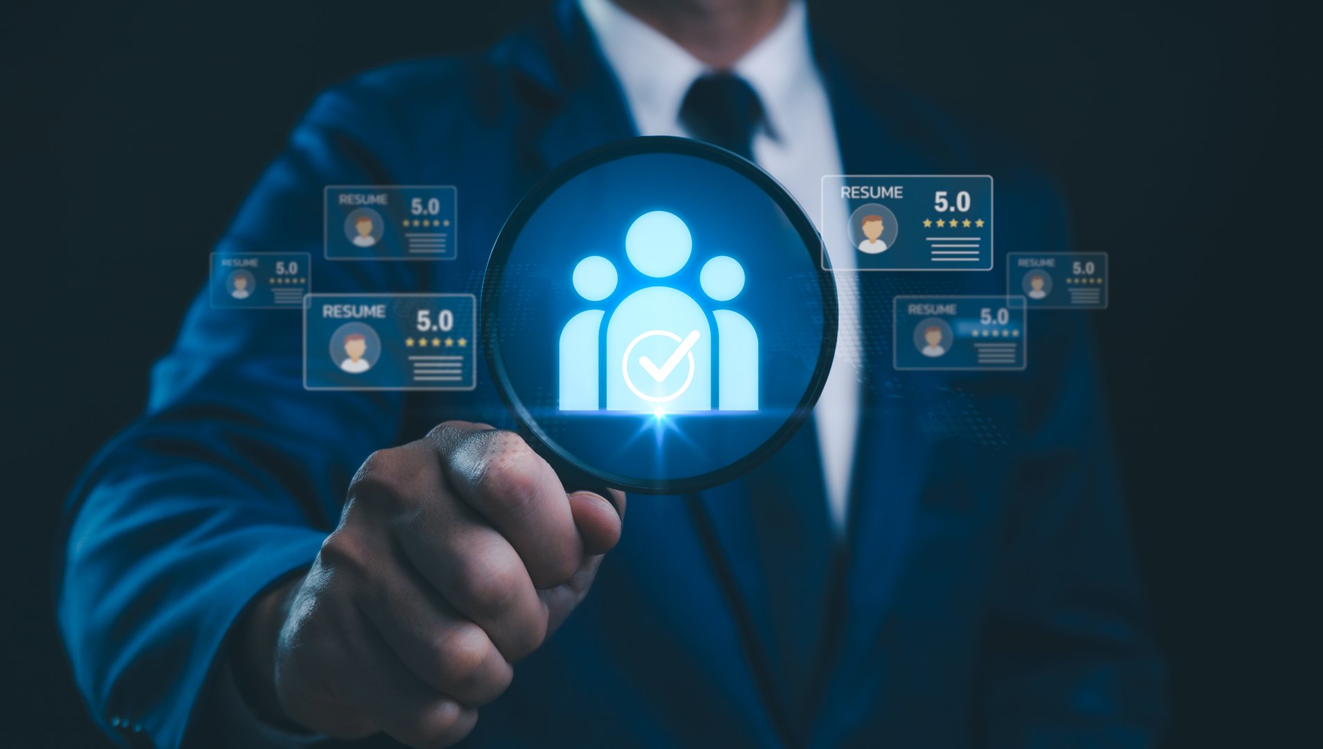 A Human Resources Manager uses a magnifying glass to search and analyze resumes online With the support of CRM systems, recruitment consultants, headhunters, and recruitment agencies, hiring process.