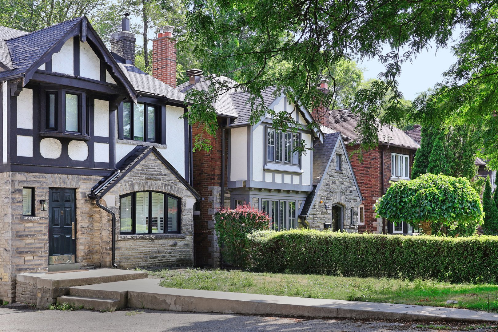 Ontario, Canada - July 26, 2025:  Older residential neighborhood with Tudor style houses