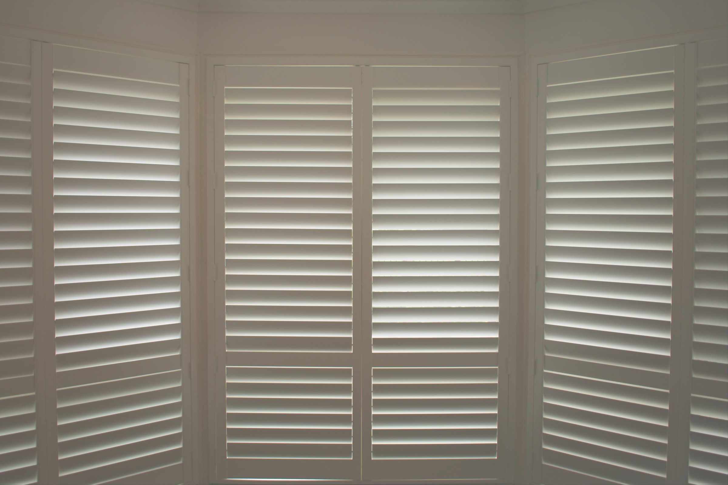 Luxury white indoor plantation shutters