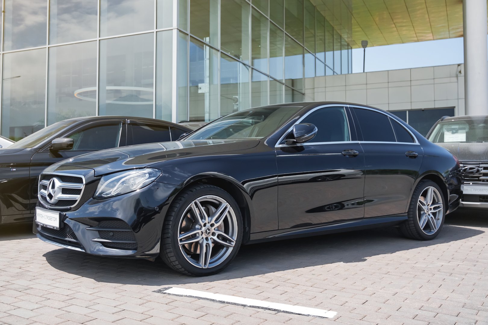 Almaty, Kazakhstan - May 29, 2025: Black Mercedes-Benz E-Class w213 2018 in a parking lot. German car manufacturer