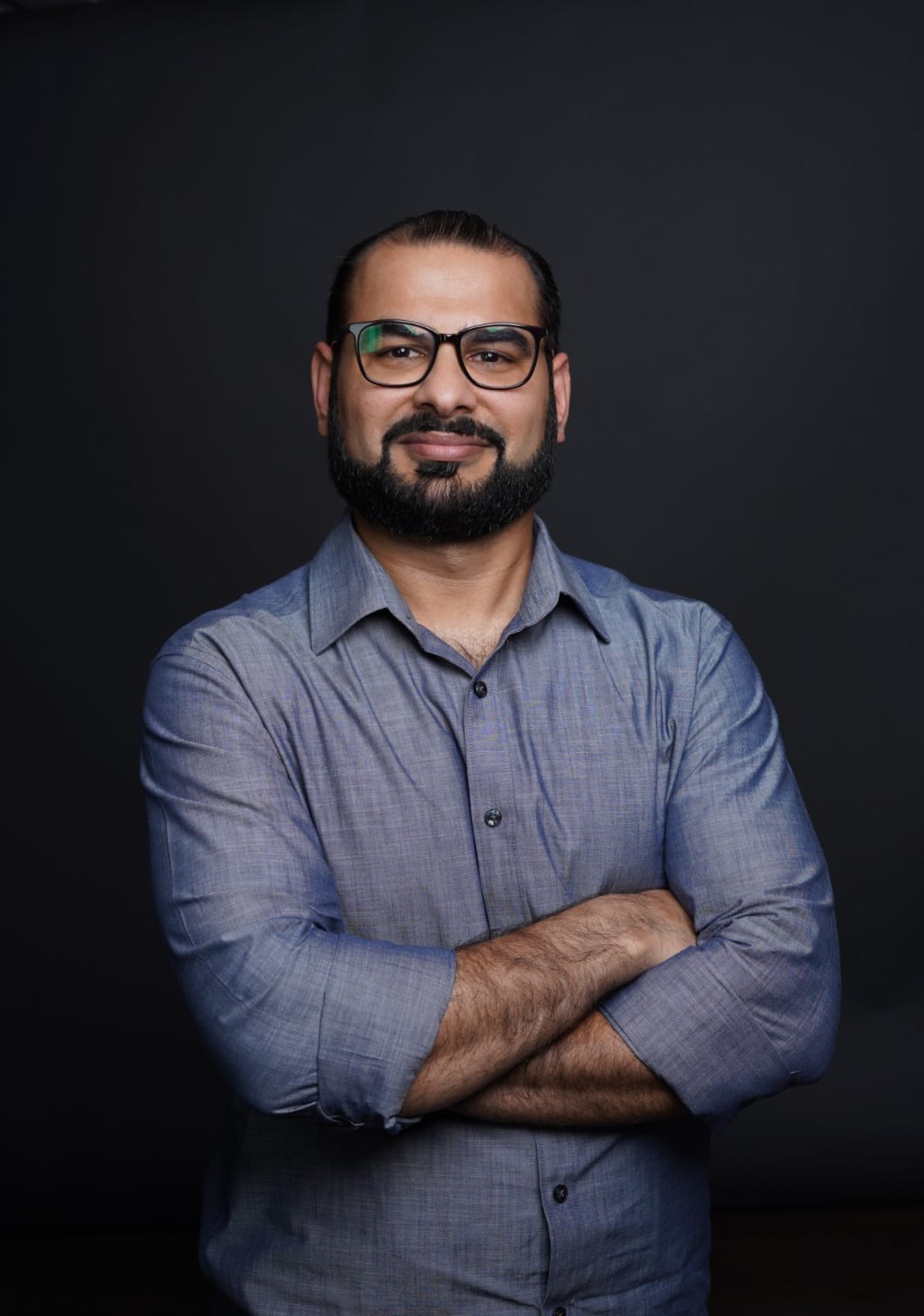 Professional headshot of Farjad Syed