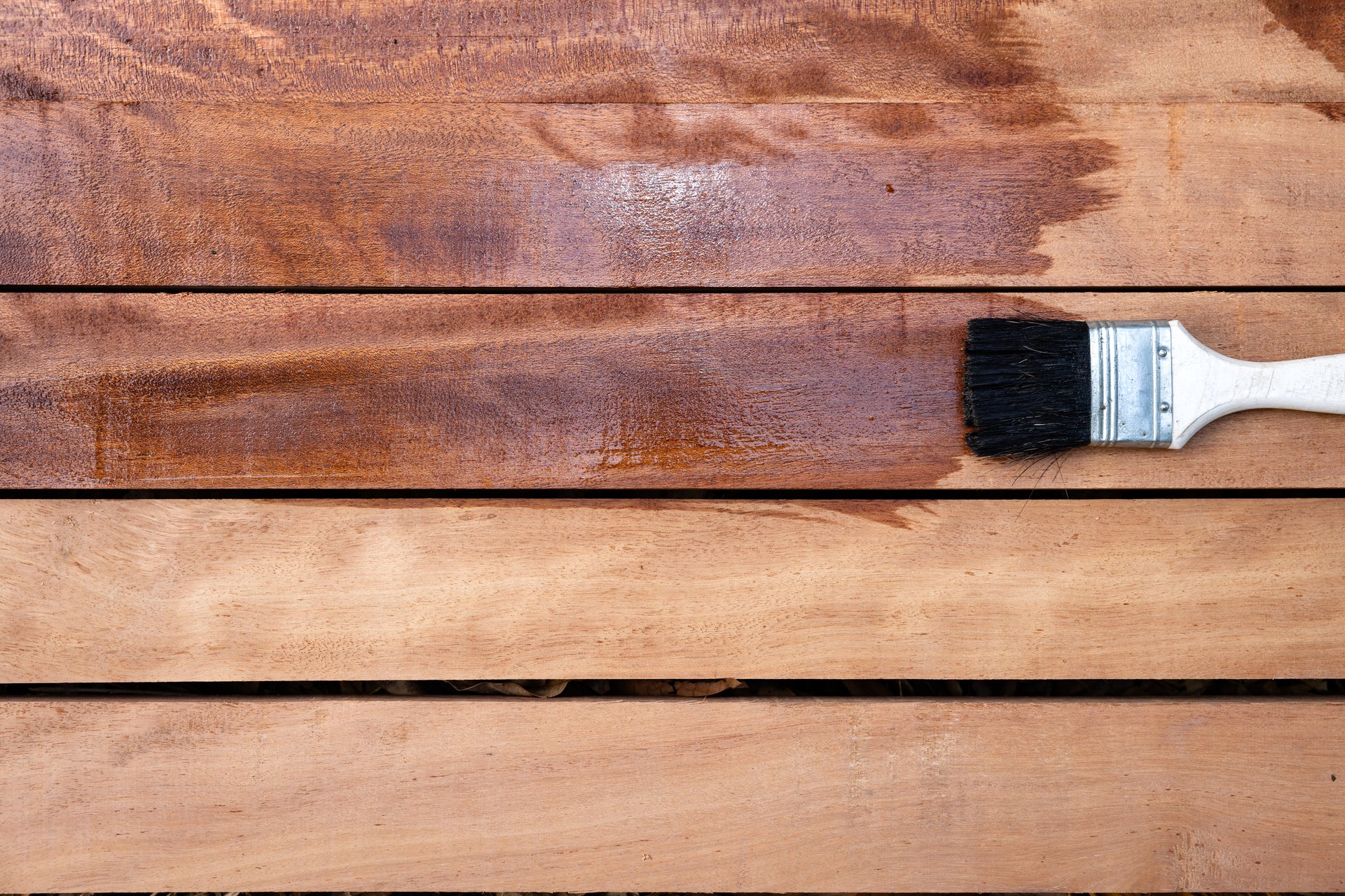 Beautiful restored wooden deck in backyard setting