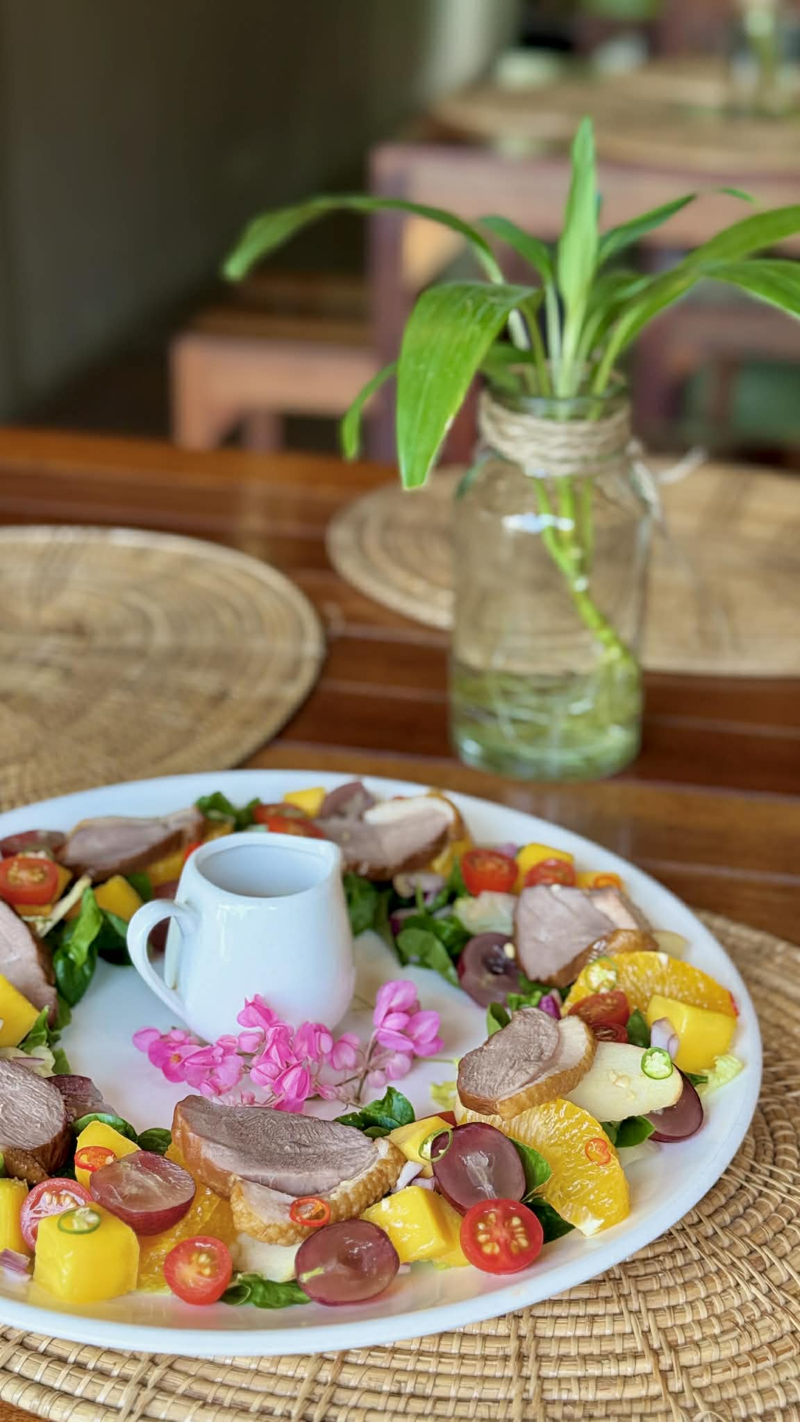 Kawin's Tropical Salad with Smoked Duck - A refreshing mix of tropical fruits and tender smoked duck