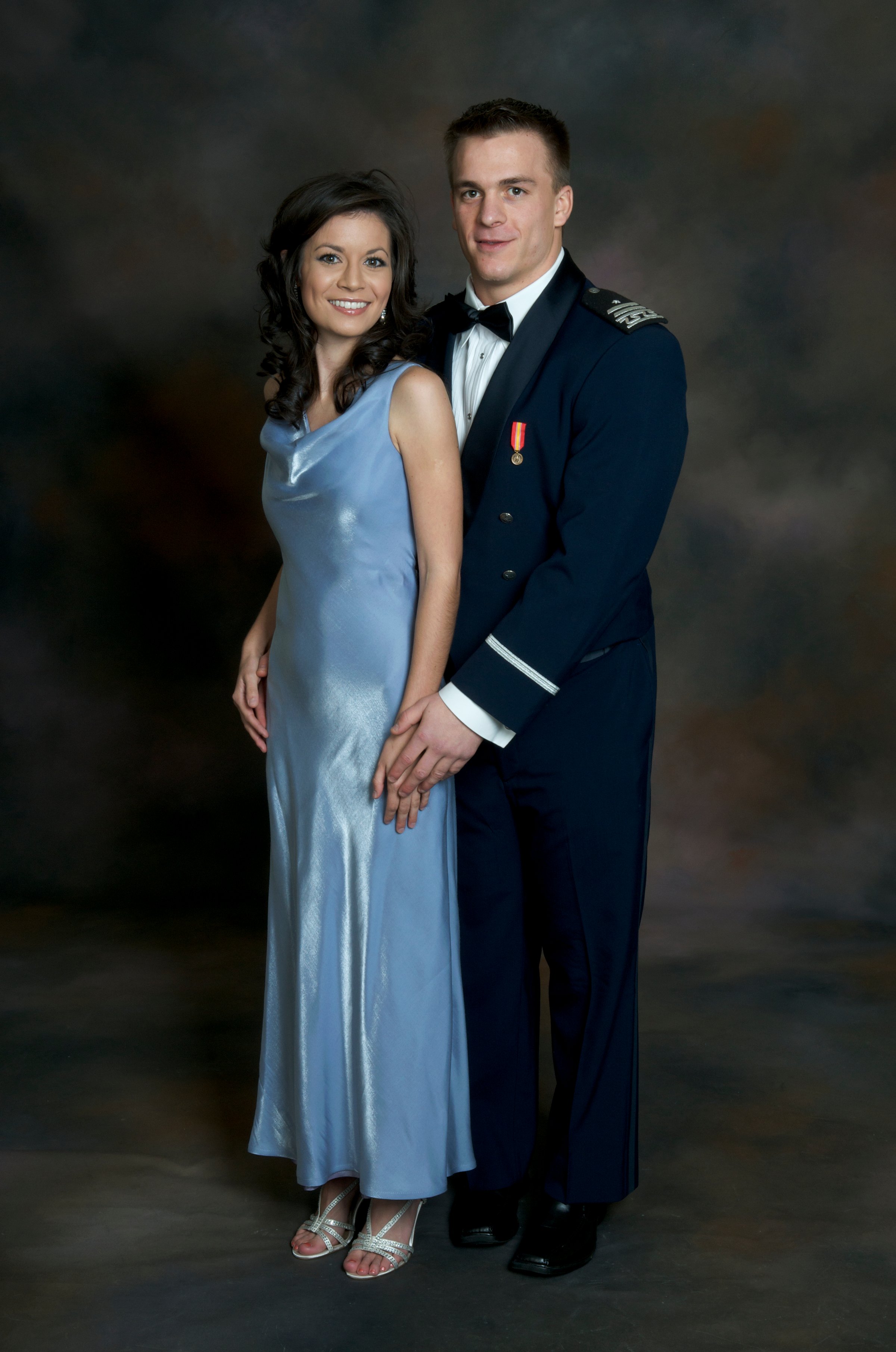 Two young adults, one a student at the U.S. Air Force Academy, dressed up for a formal ball.
