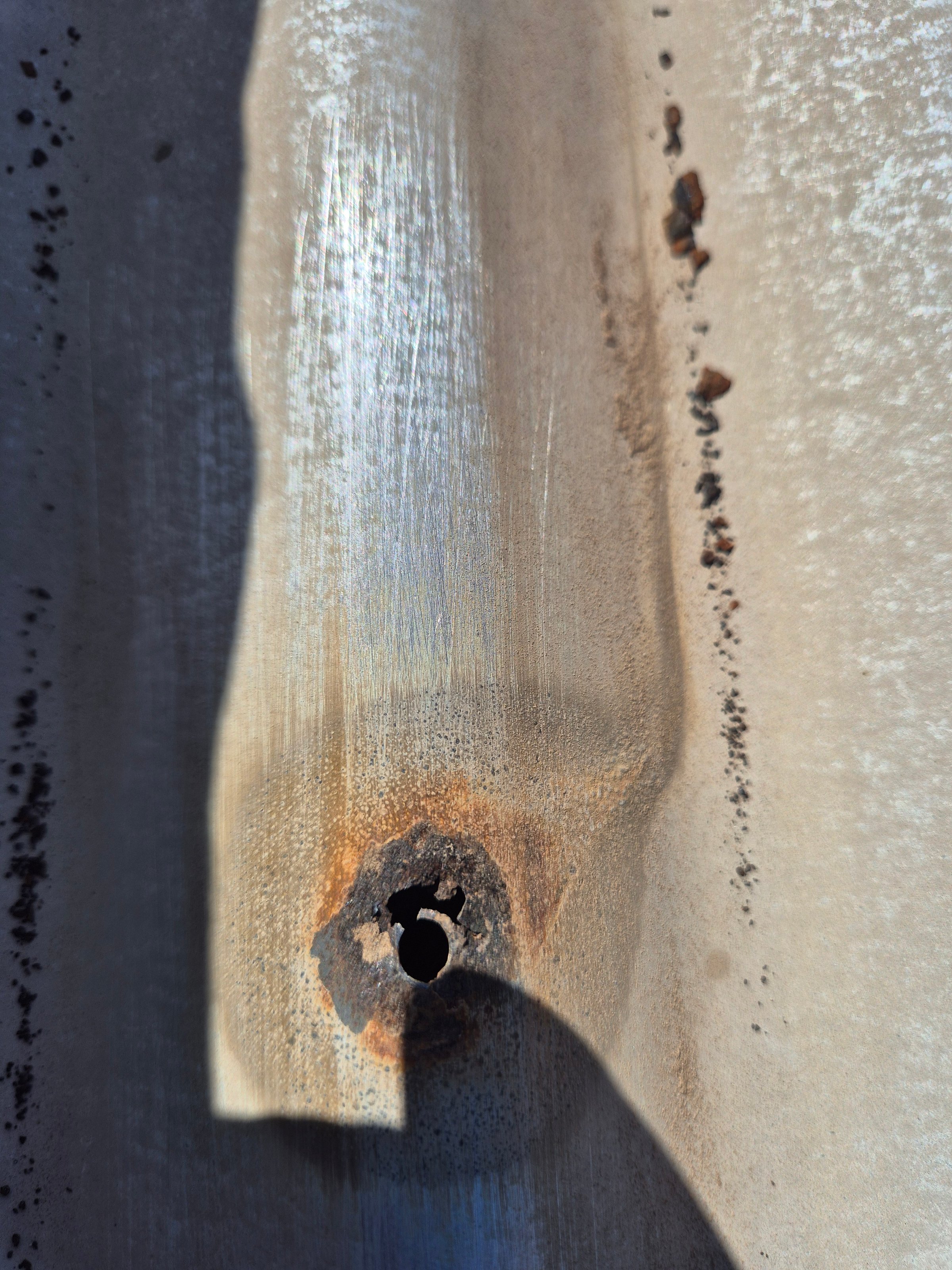 Rust treatment and protective coating application by Quality Painting Group