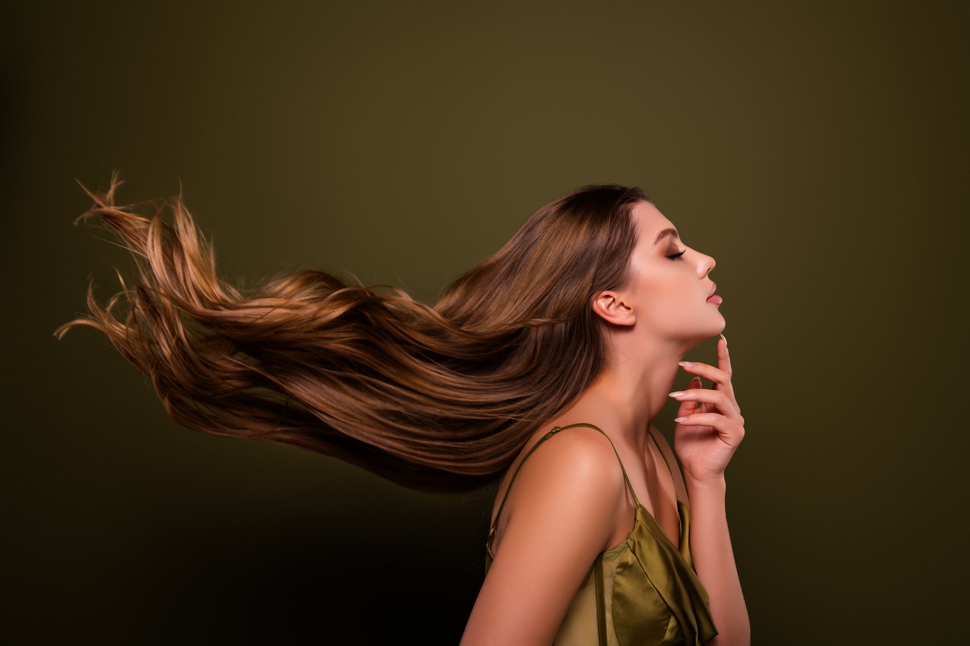 Photo of elegant tender gorgeous lady long straight healthy hair isolated on khaki color background.