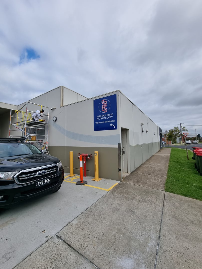 Quality Painting Group retail store makeover - July 2024 mid-project work showing detailed commercial painting techniques