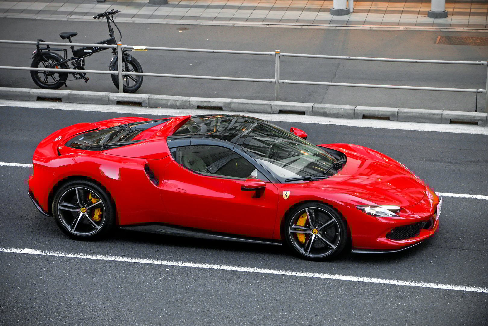 Tokyo, Japan - January 13, 2025: Luxury supercar Ferrari 296 GTS (Type F171) in the city street.