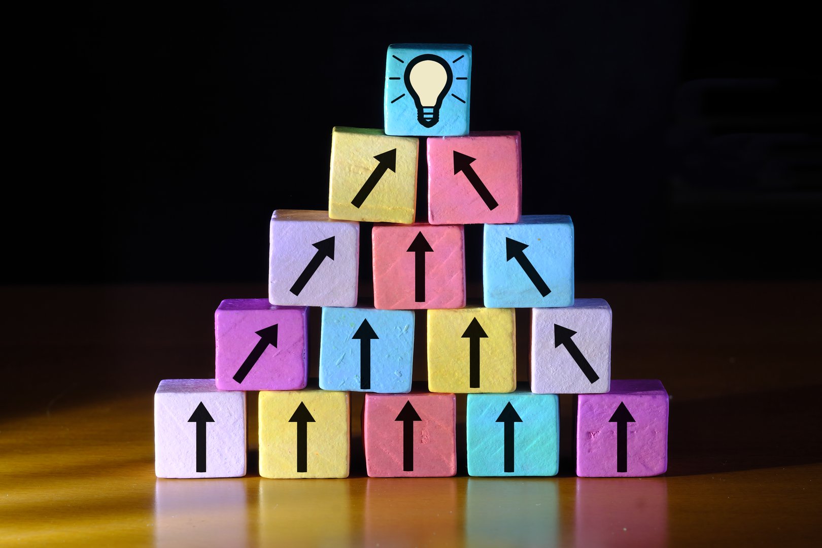 Business concept,collaboration,cooperation,teamwork makes the dream work, innovation,human resources,recruitment,team building, arrows and lightbulb symbols