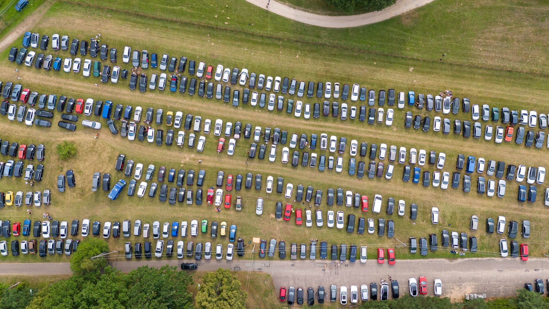 Drone photography of a music festival car park during summer cloudy day