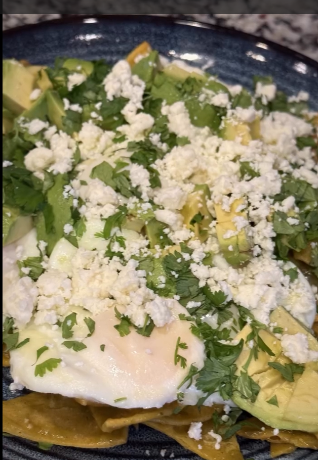 Chilaquiles with crispy tortilla chips, eggs, and toppings