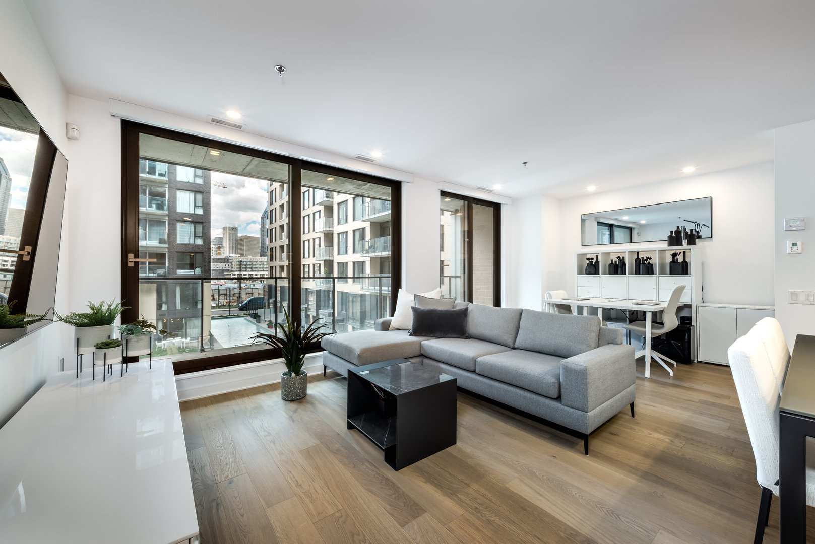 Very well staged condo in district Griffintown fo Montreal, Canada with high end furniture, bedroom and bathroom all taged
