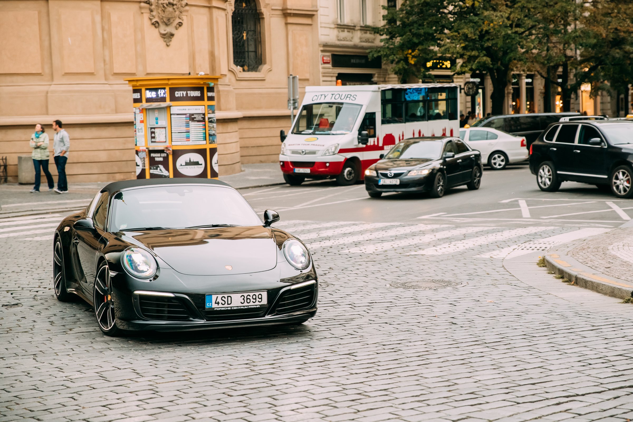 Prague, Czech Republic - September 23, 2017: Front View Of Black Porsche 991 Targa 4S Car Moving On Street. Car Of Second Generation