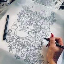 Inkspirations Tattoo artist at work