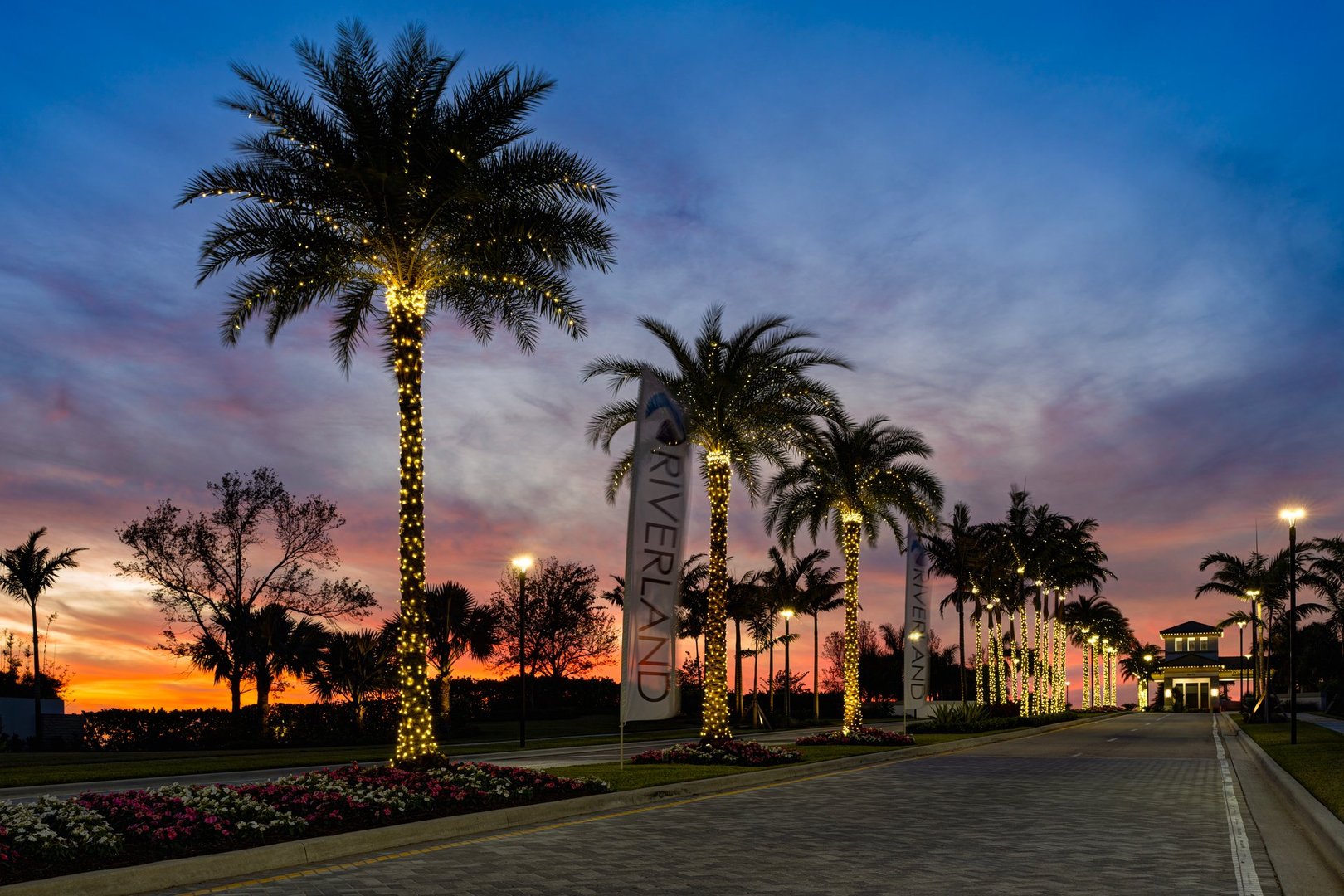 Port St. Lucie, Florida, USA - December 10, 2024:    Entrance to Valencia Walk at Riverland.  Sunset, Christmas time.