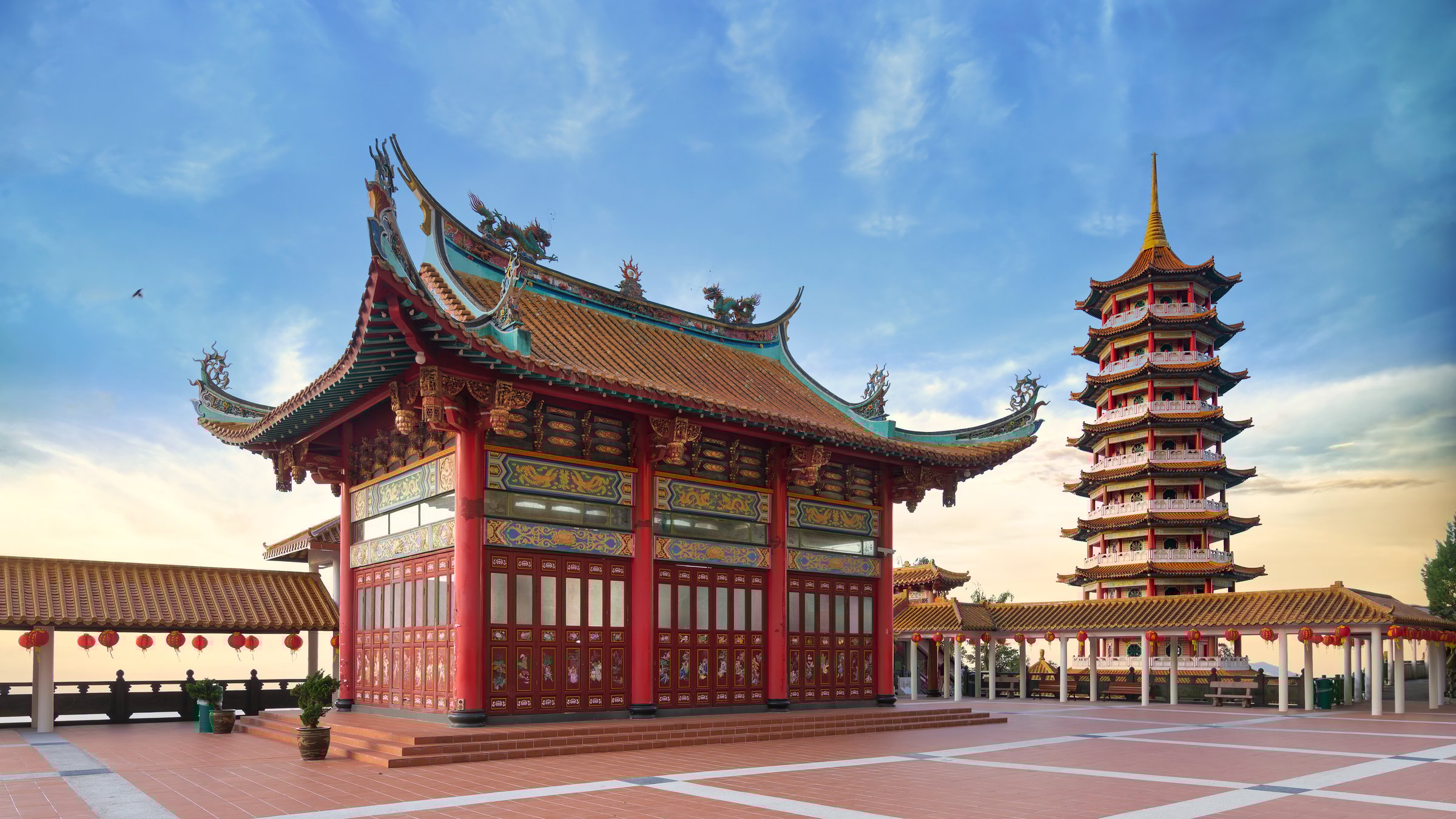The Chin Swee Caves Temple in Genting Highlands, Malaysia, is renowned for its exquisite architecture, intricate design, and serene ambiance, set against the backdrop of tranquil skies