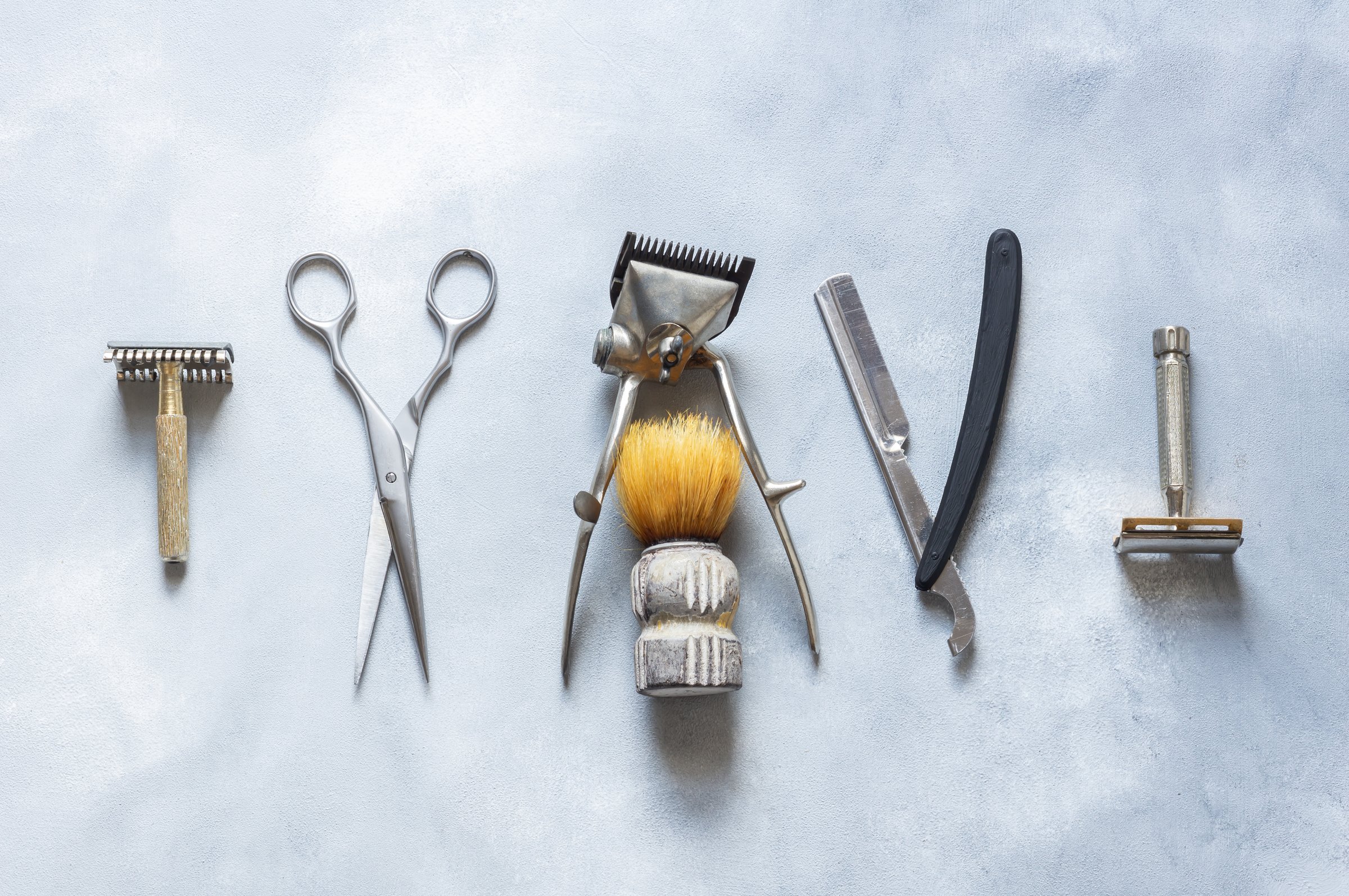 Vintage Barber supplies , hair and beard accessories for man, old shaving machine, scissors, old razor,  barber nostalgia poster