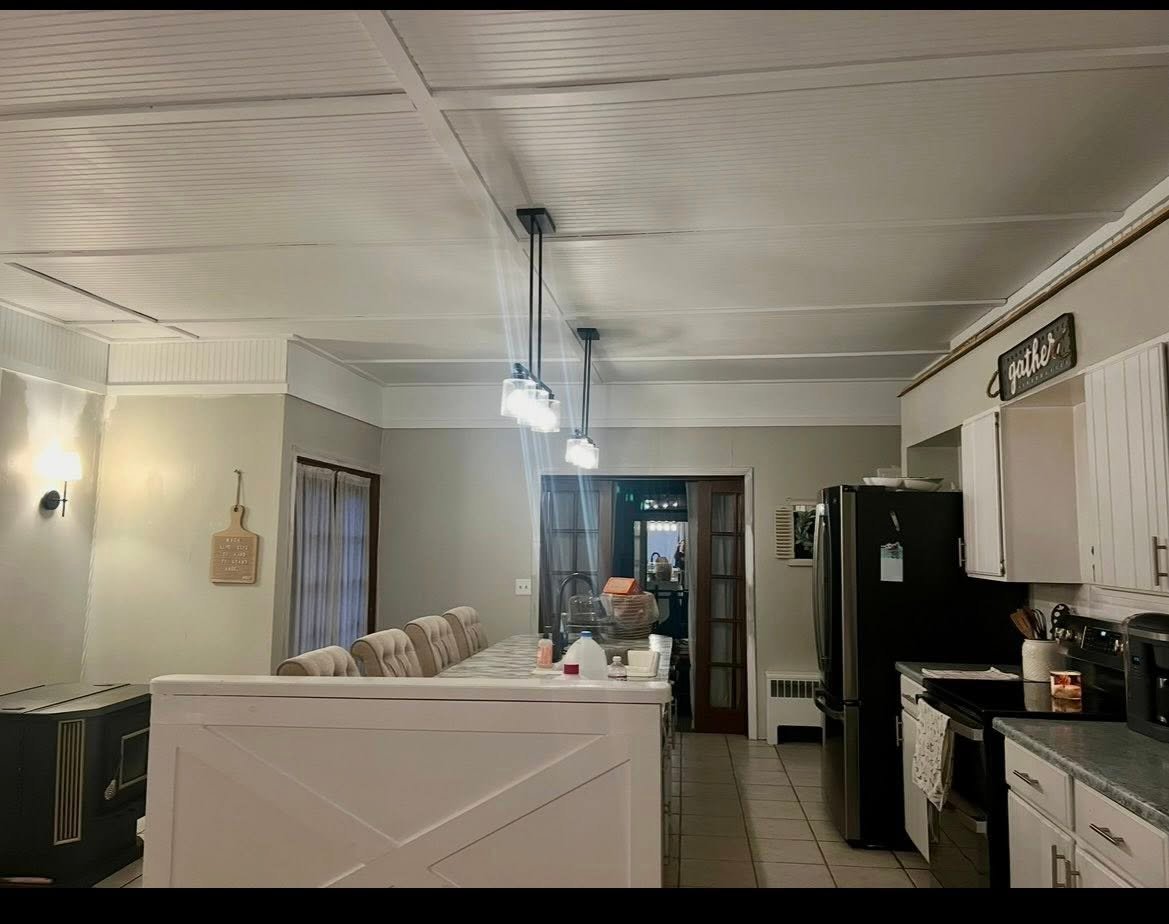 After - Beautiful painted beadboard ceiling completed