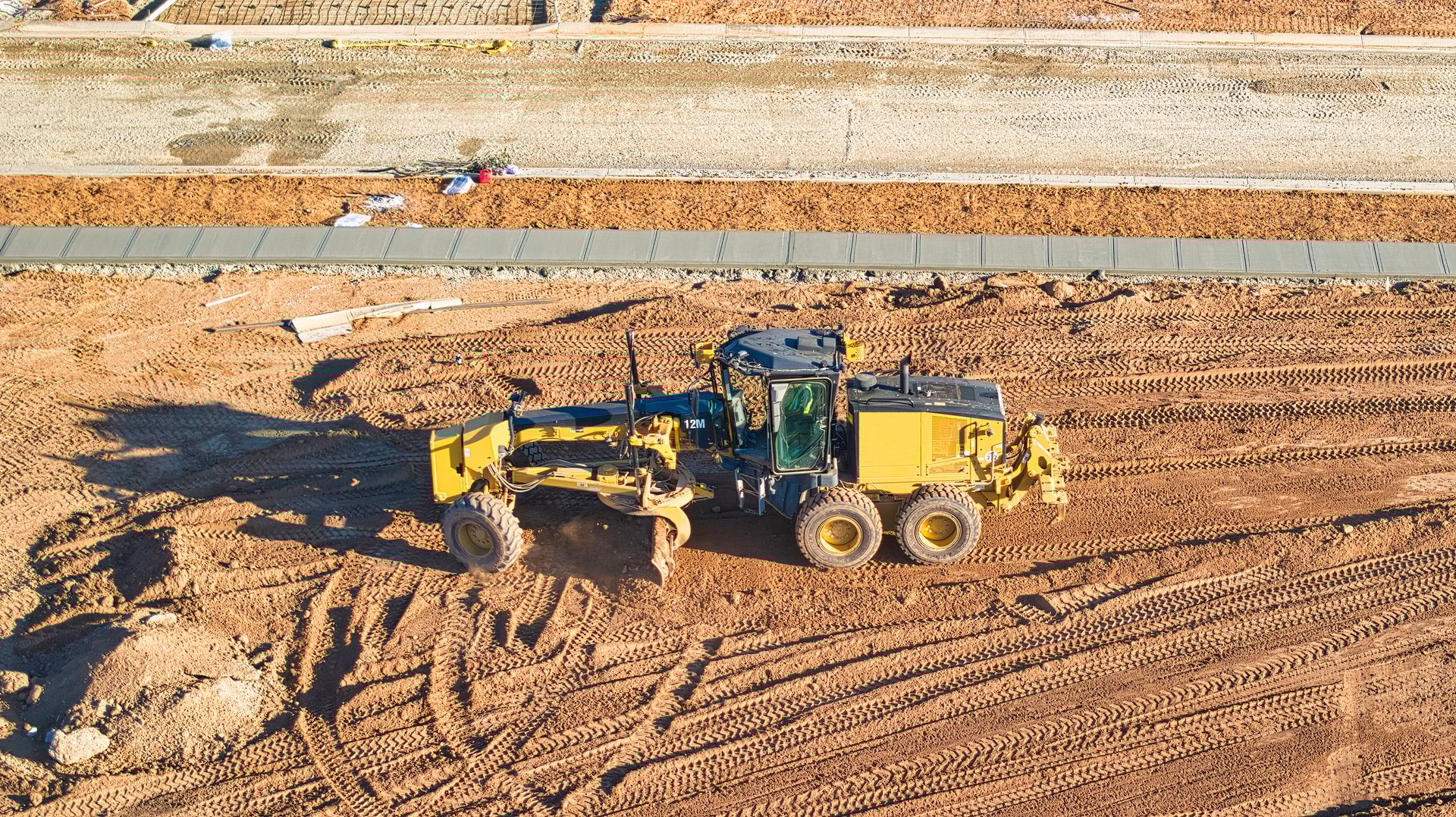 Yarrawonga, Victoria, Australia - 17 June 2024: Grader leveling ground on a building site in Yarrawonga