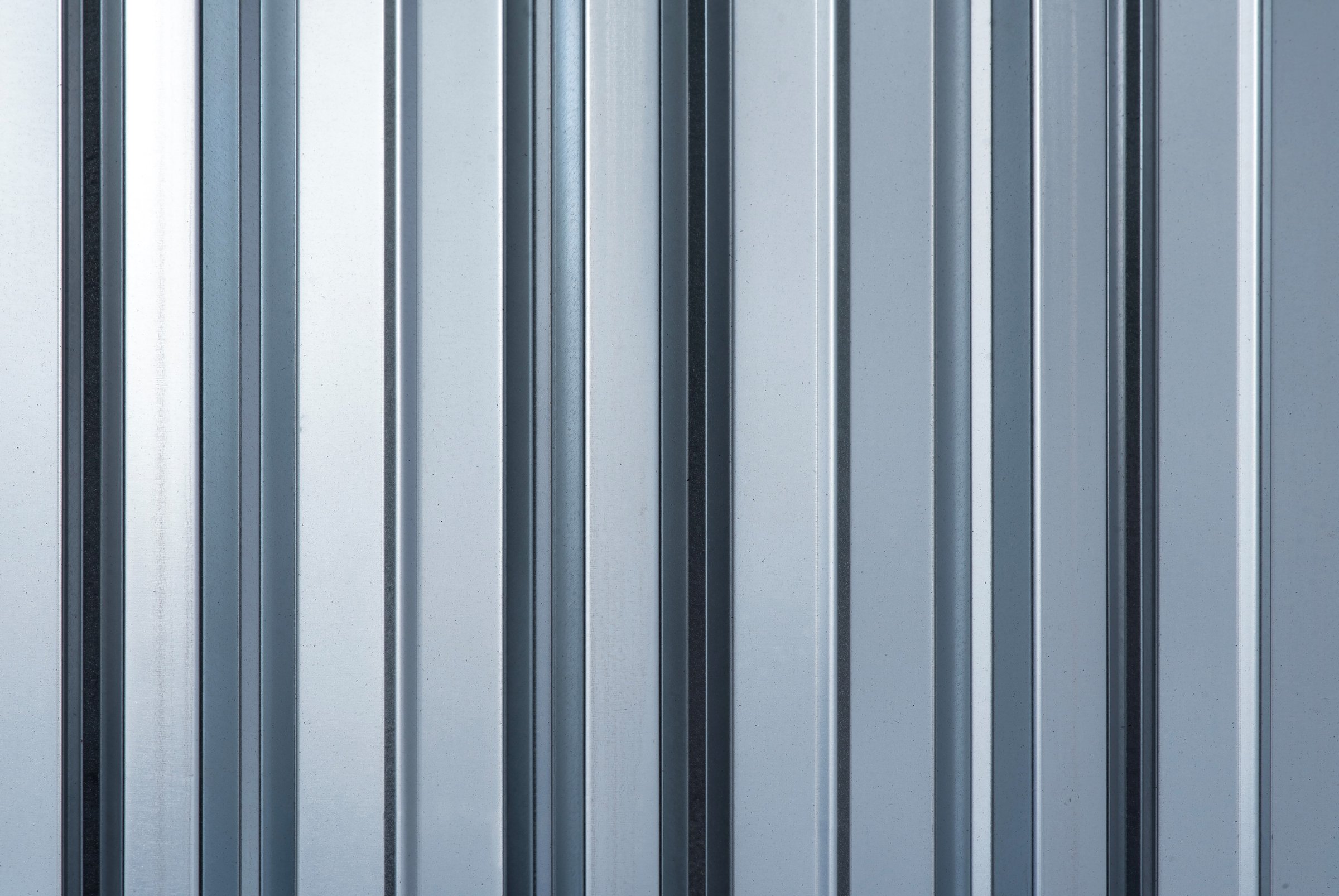 Vertical galvanized metal surface close-up