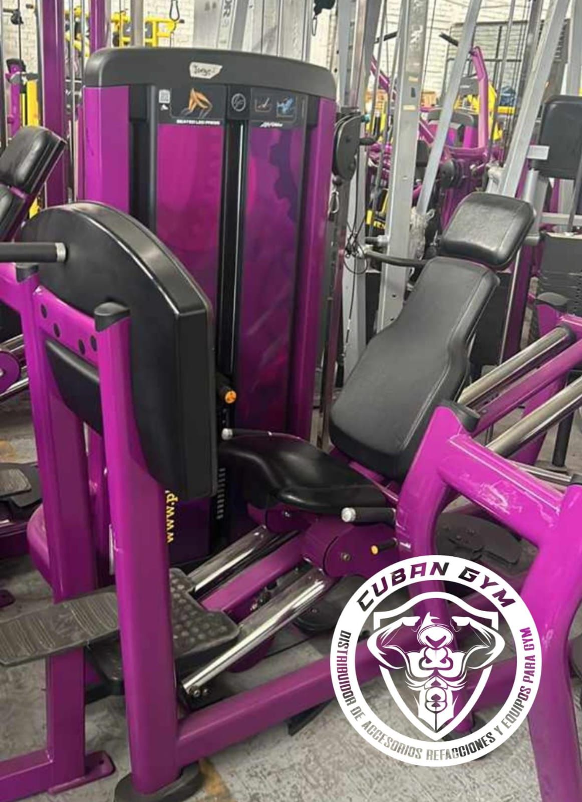 Purple leg press machine in a gym with Cuban Gym logo on the image.