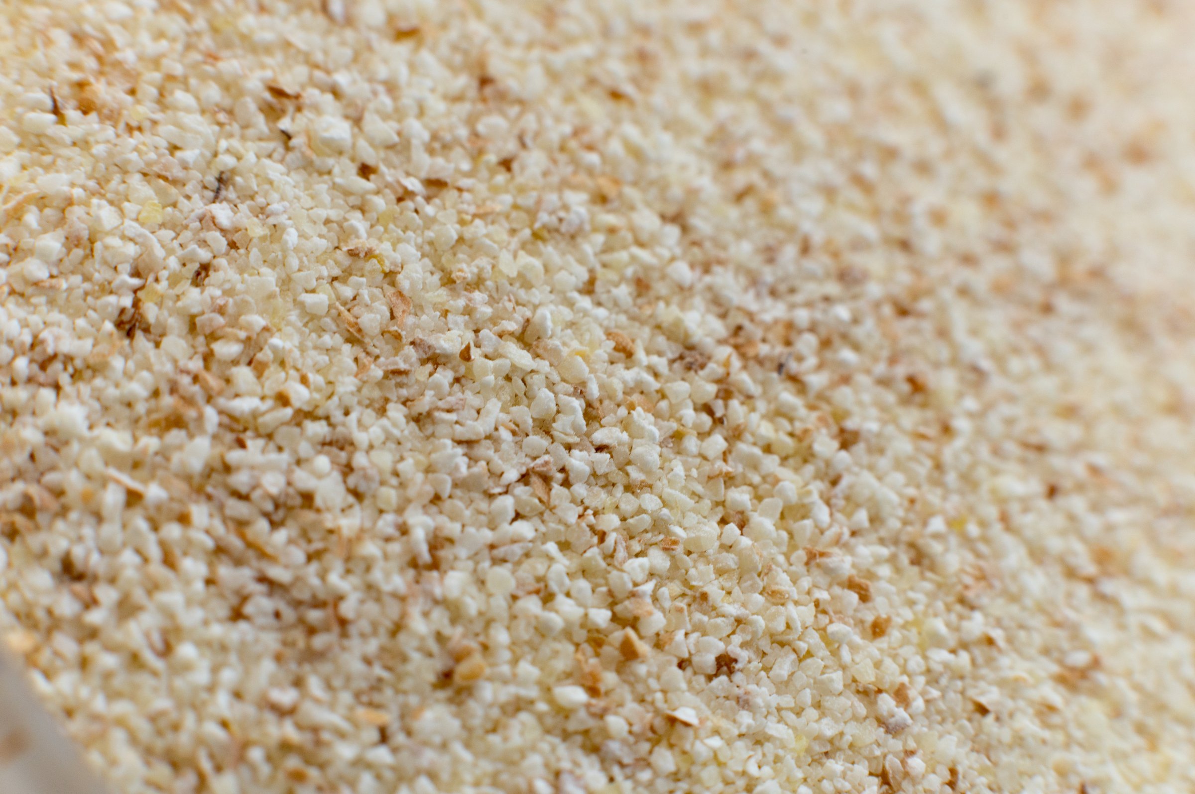 Close-up of raw semolina background