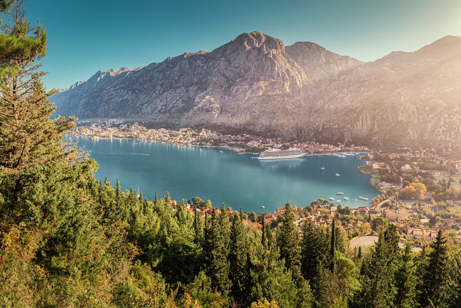 Beautiful view of Kotor bay with cruise ship at sunset, Montenegro