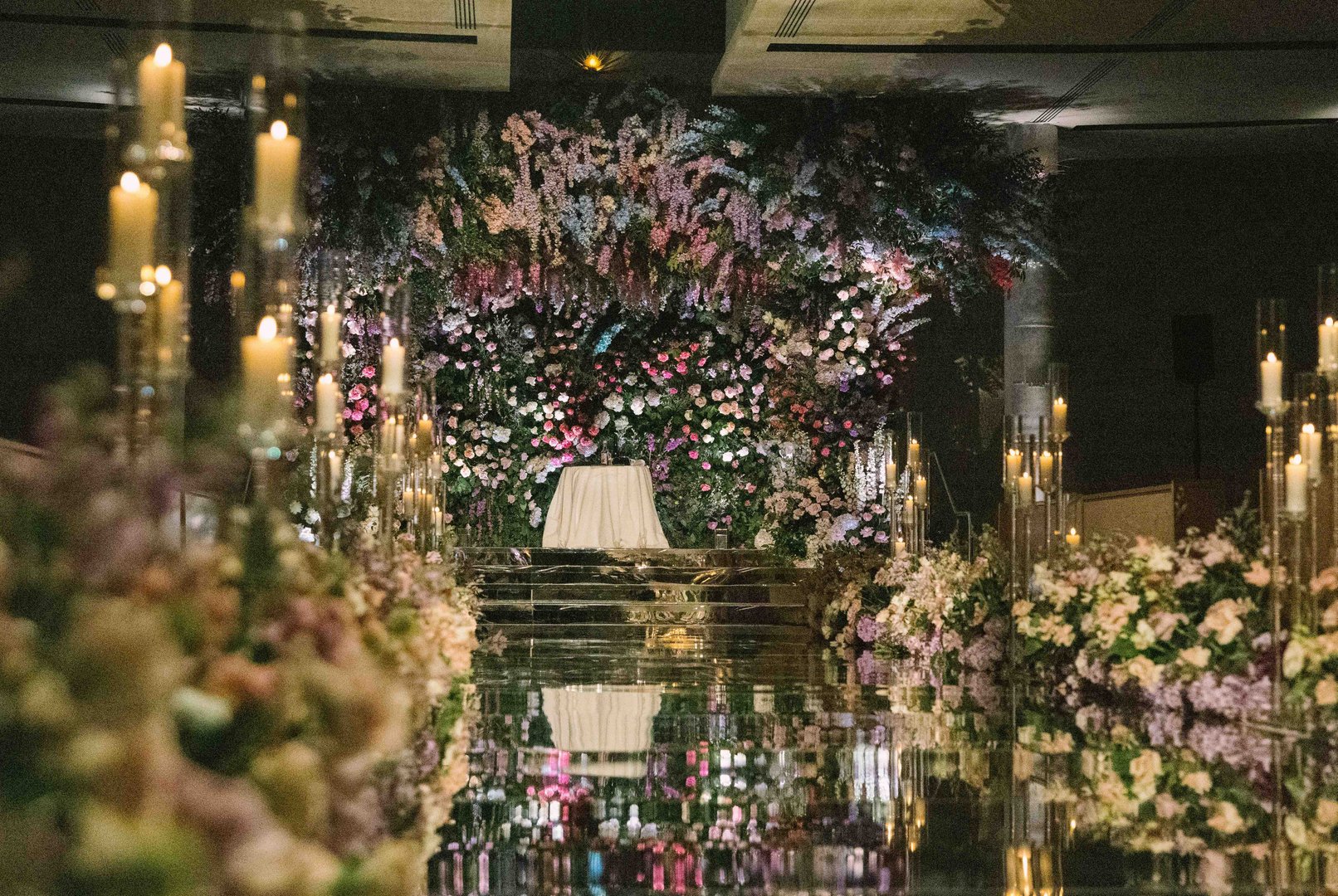 Newlyweds walking hand in hand at wedding ceremony