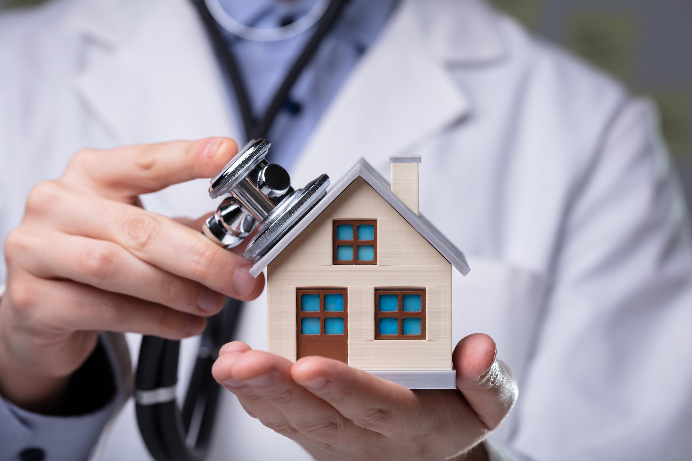 Doctor reviewing property investment plans