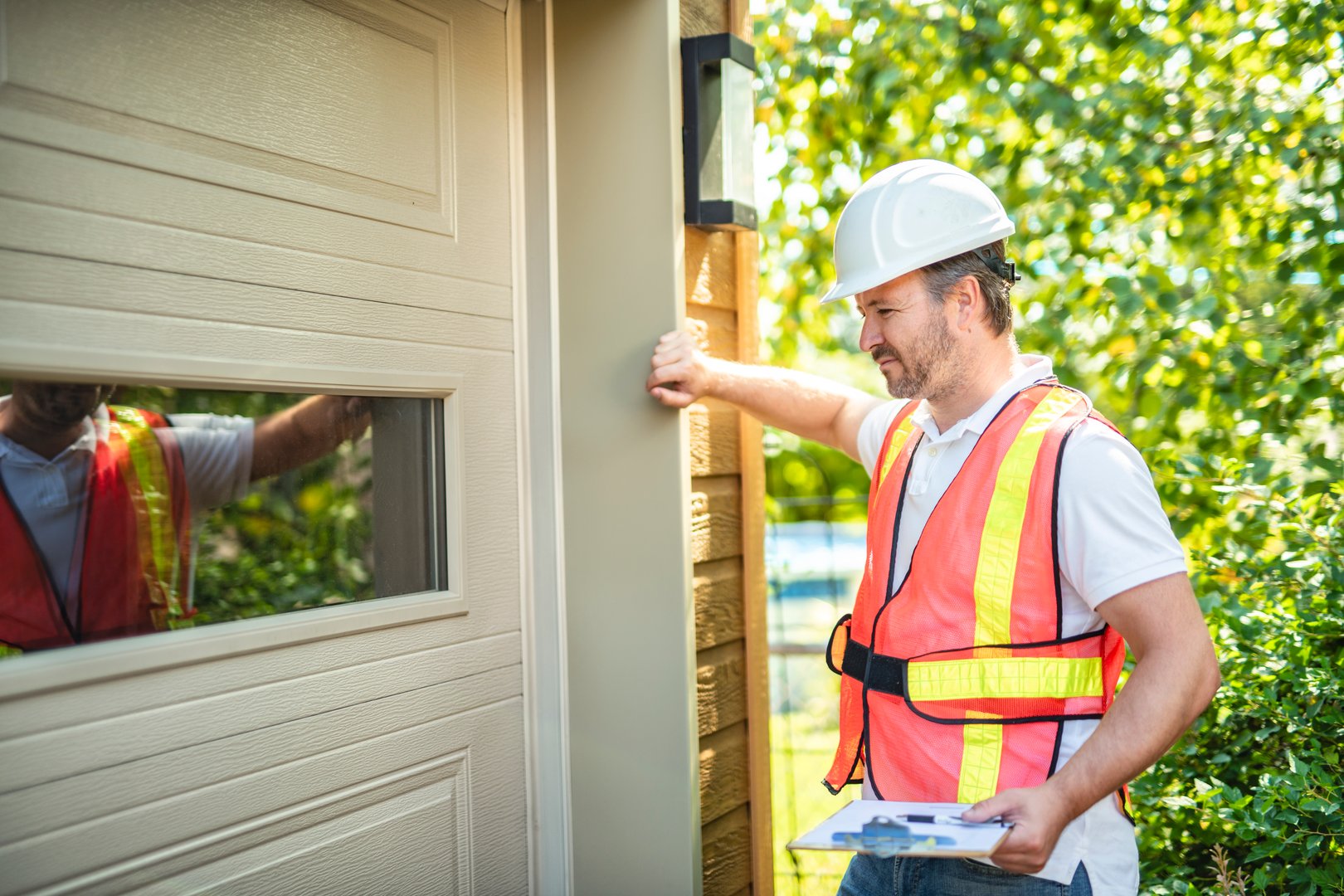 A nice men inspector or Fixing a garage door