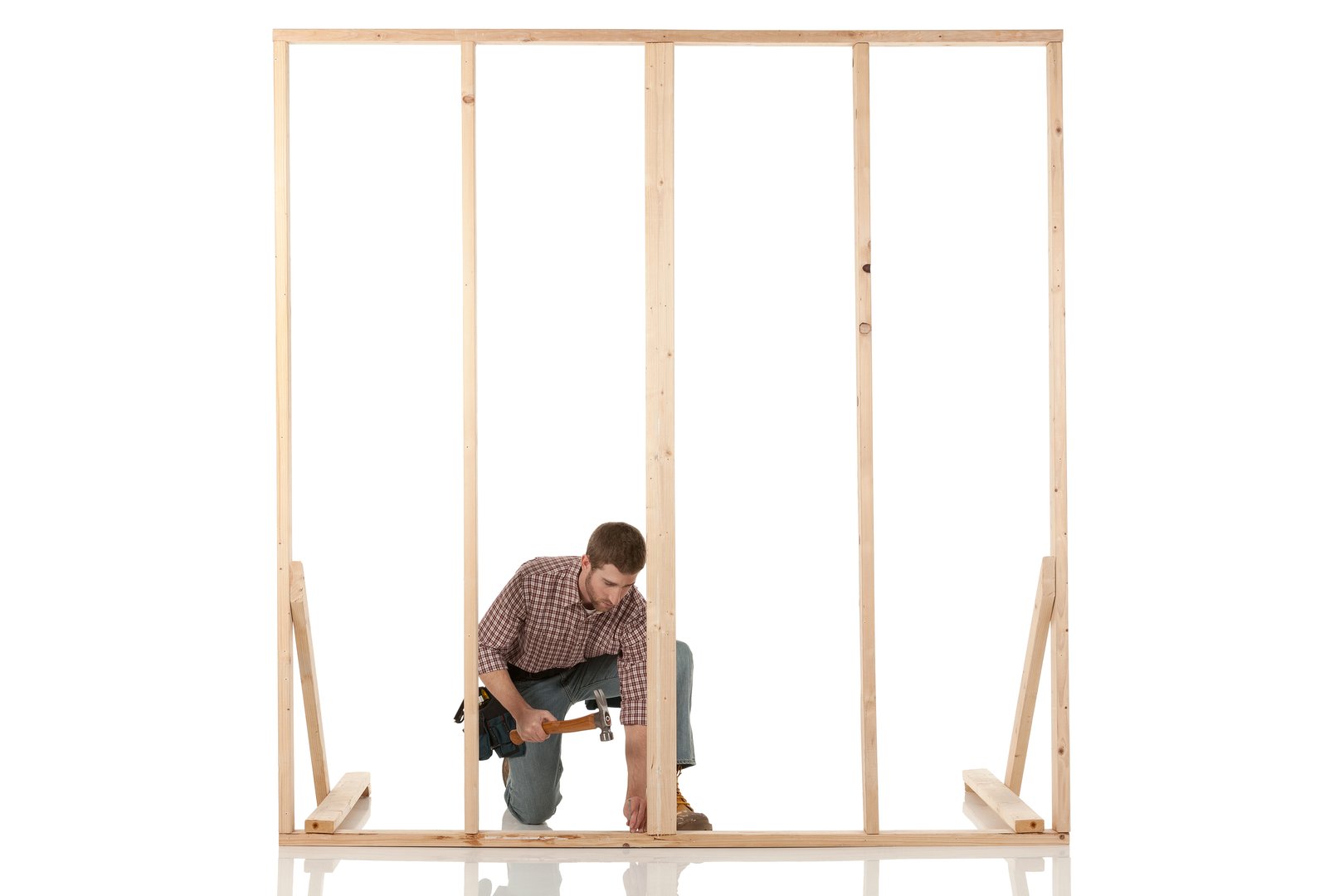 Carpenter working on a framehttp://www.twodozendesign.info/i/1.png