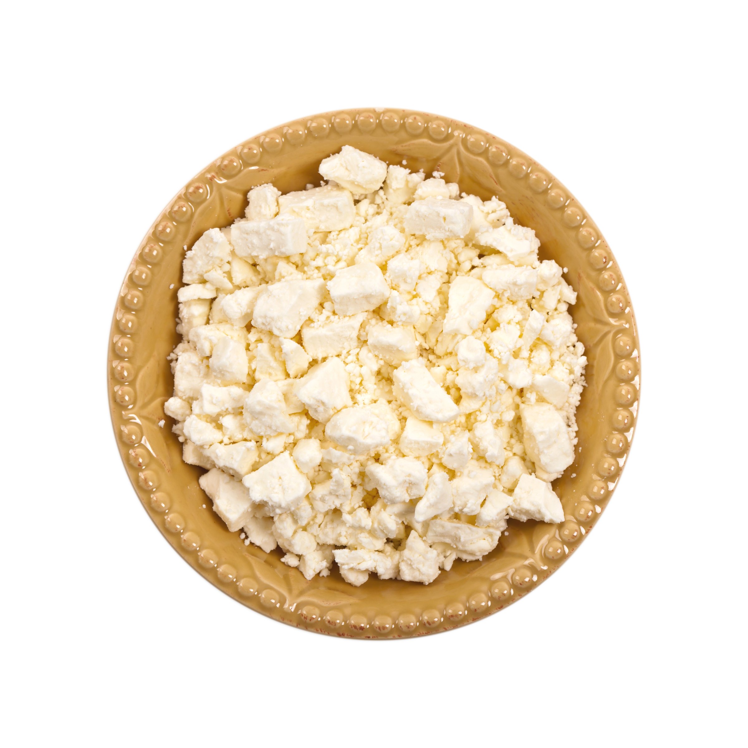 Feta Crumbled Cheese Isolated on White. Selective focus.