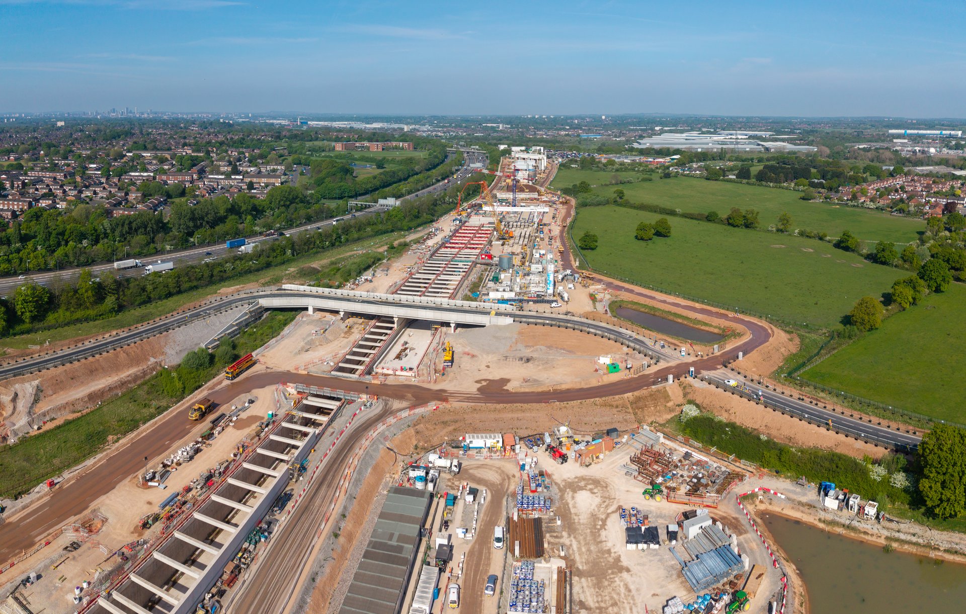 An aerial panoramic view of the HS2 high speed rail project construction site near Water Orton and Coleshill Parkway to the South of Birmingham
