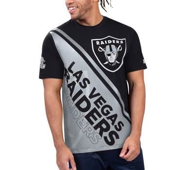Man wearing a black Las Vegas Raiders t-shirt with a large logo and diagonal stripe design.