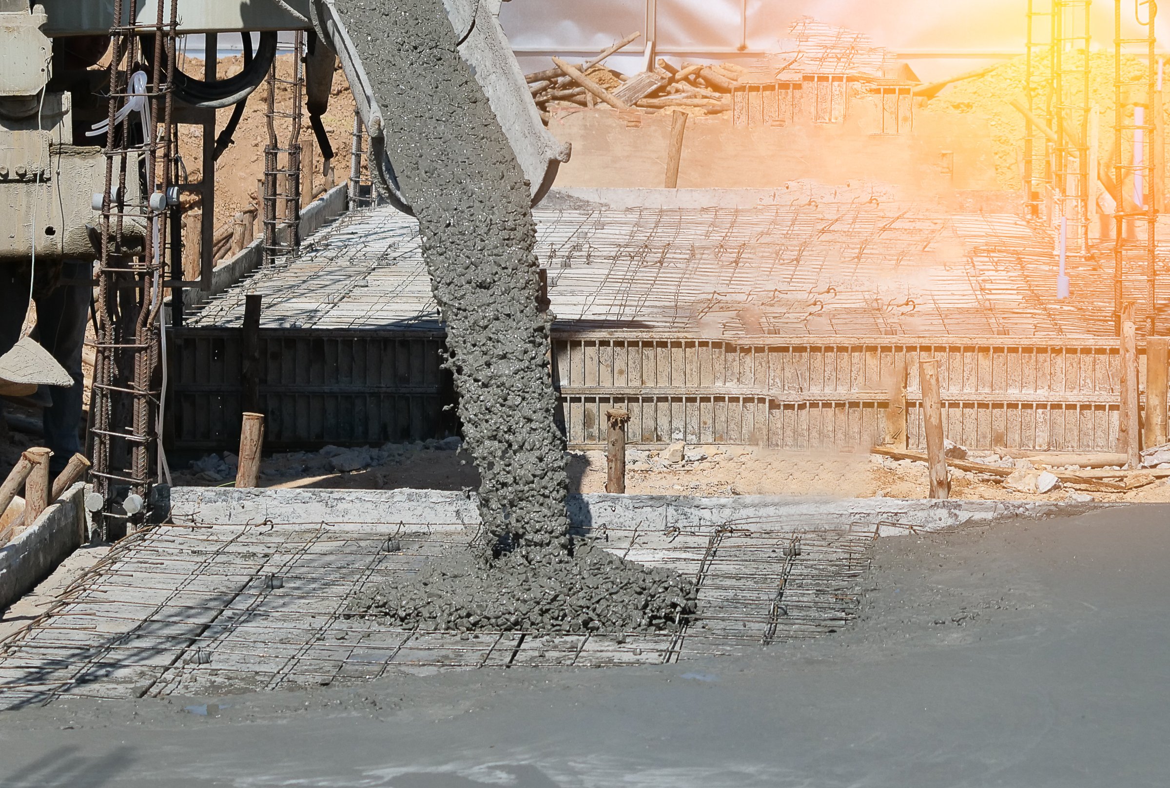 Pouring concrete from the truck to the ground