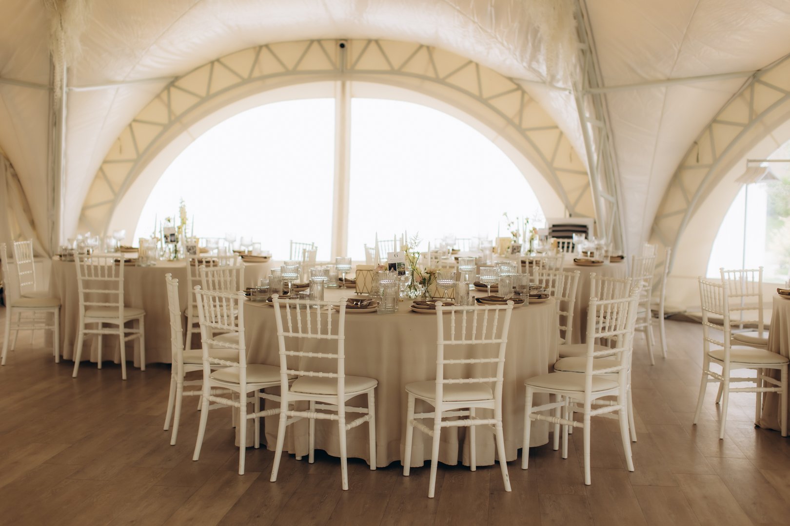 Elegant event setup with tables and decorations