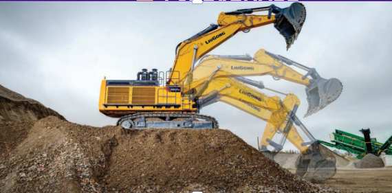 A yellow excavator with multiple arms scooping dirt on a construction site under a cloudy sky.