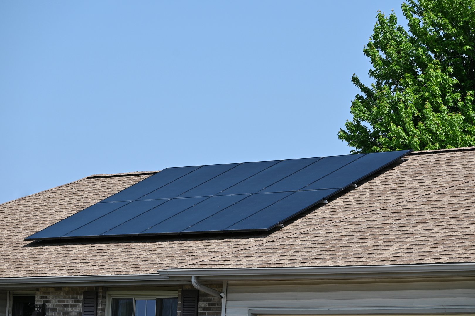 Solar panels on a ranch-style house.