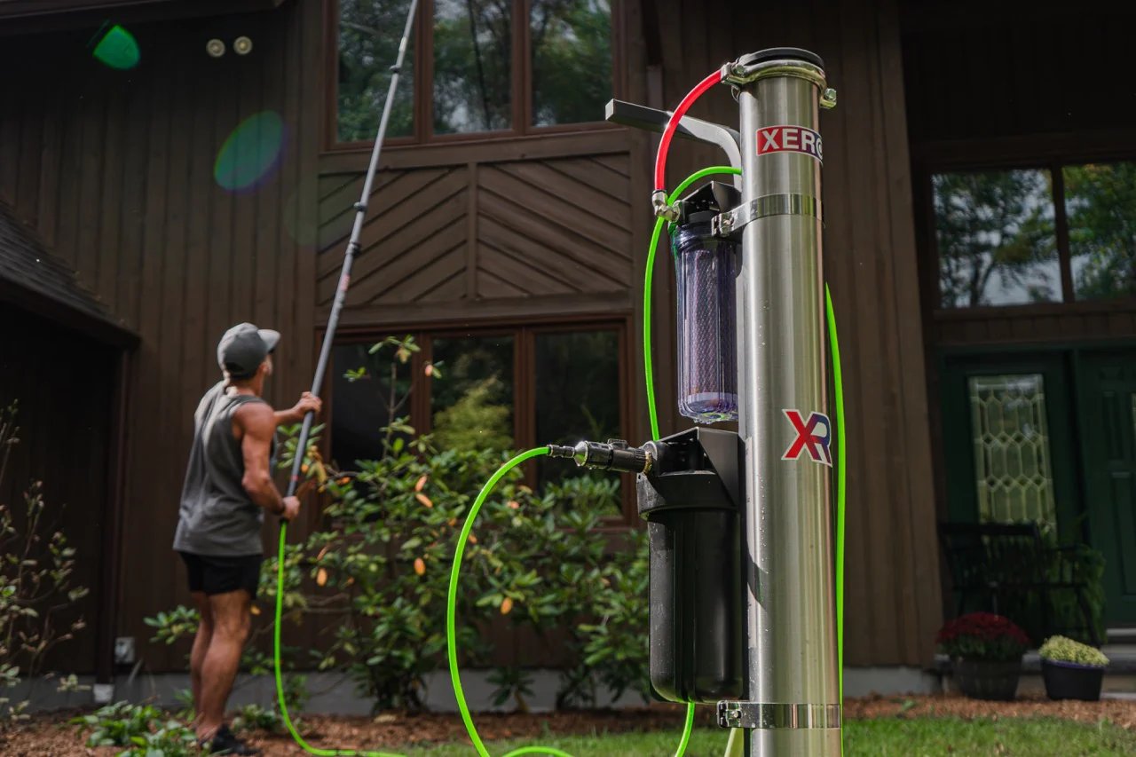 XERO Pure reverse osmosis system with window cleaner in background