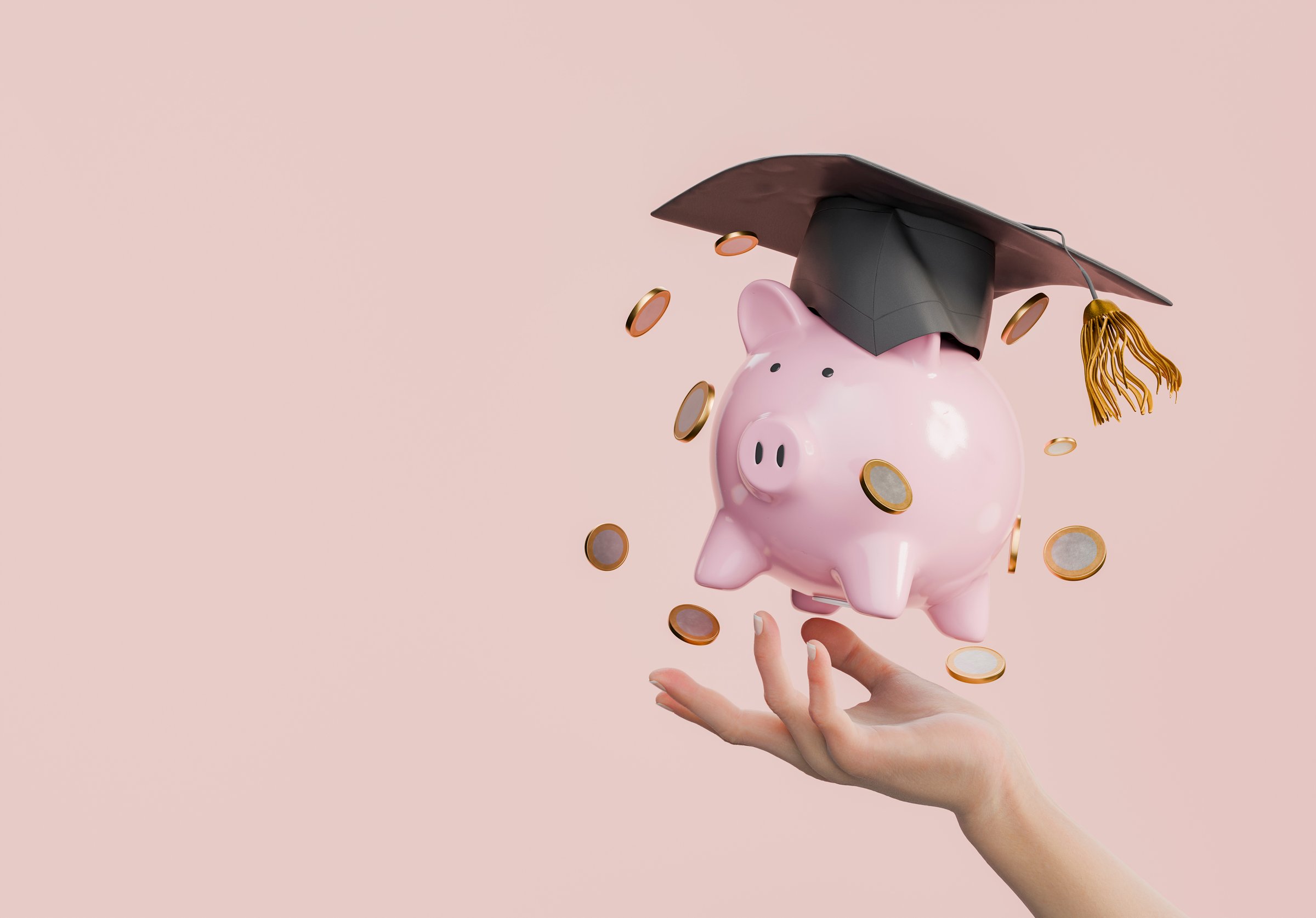 Pink piggy bank wearing a graduation cap, surrounded by coins, held by a hand on a pink background. Education and savings concept. 3d rendering