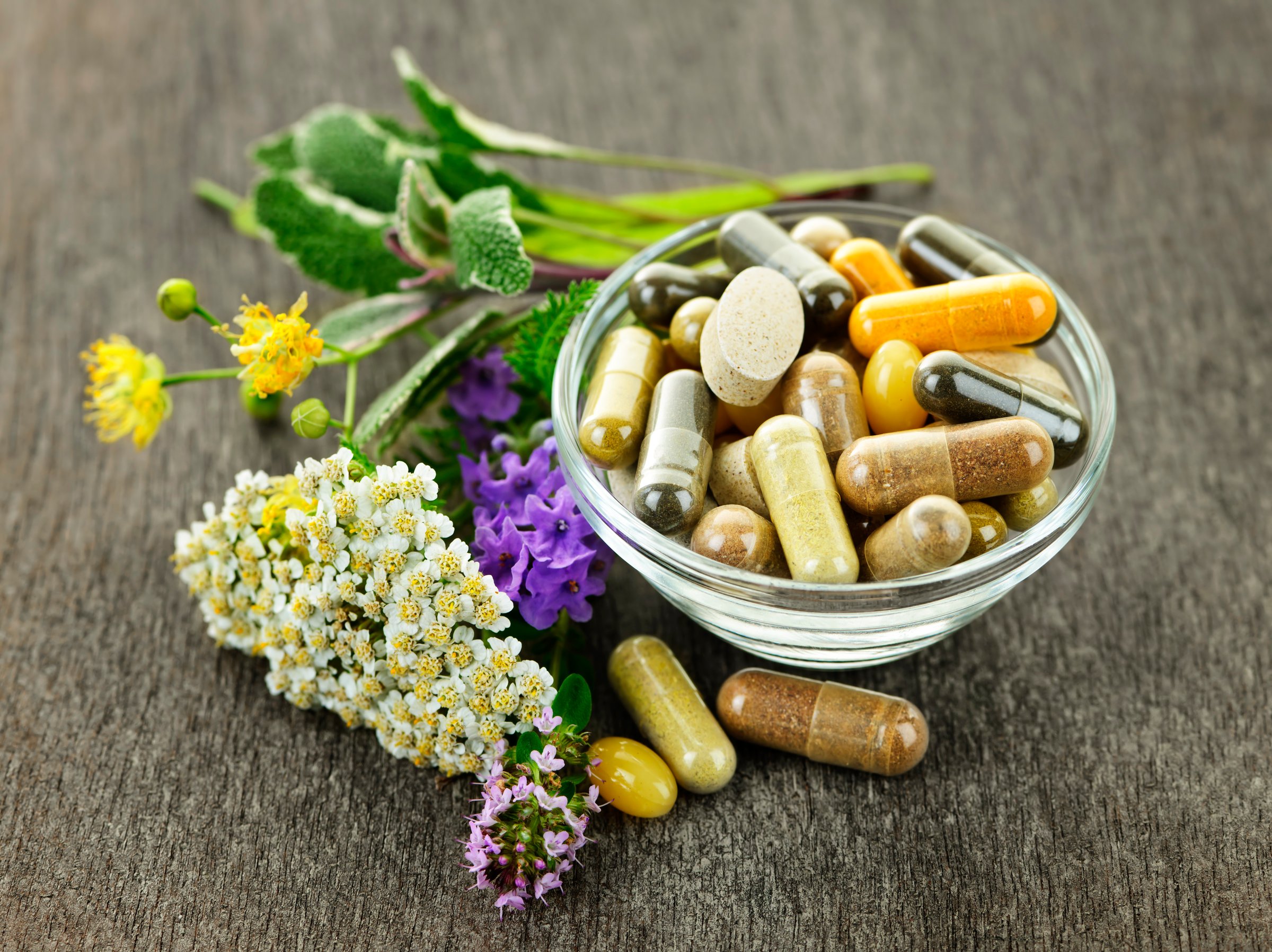 Herbs with alternative medicine herbal supplements and pills