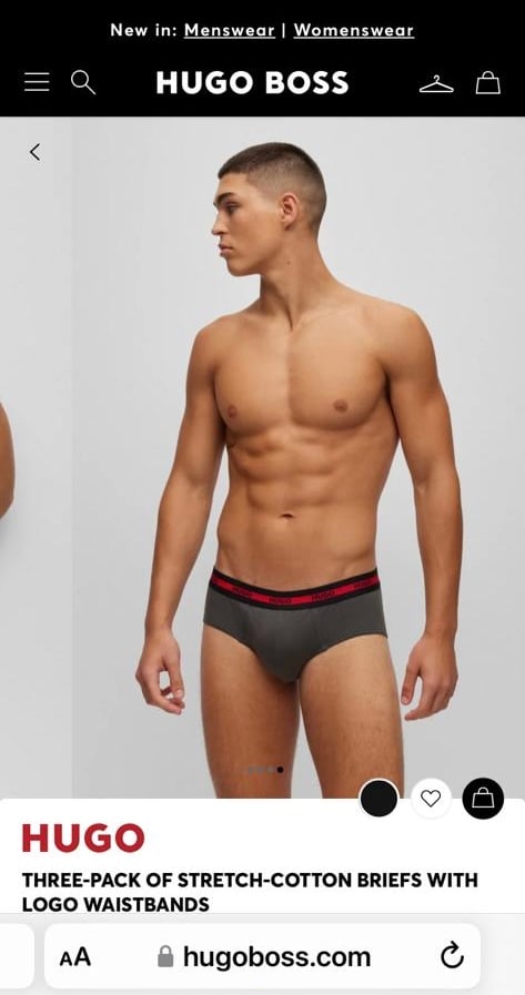Underwear model showcasing Hugo Boss briefs, athletic physique, professional fashion modelling shoot