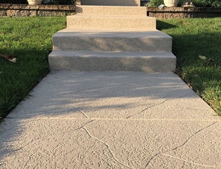 Residential outdoor walkway with resurfacing