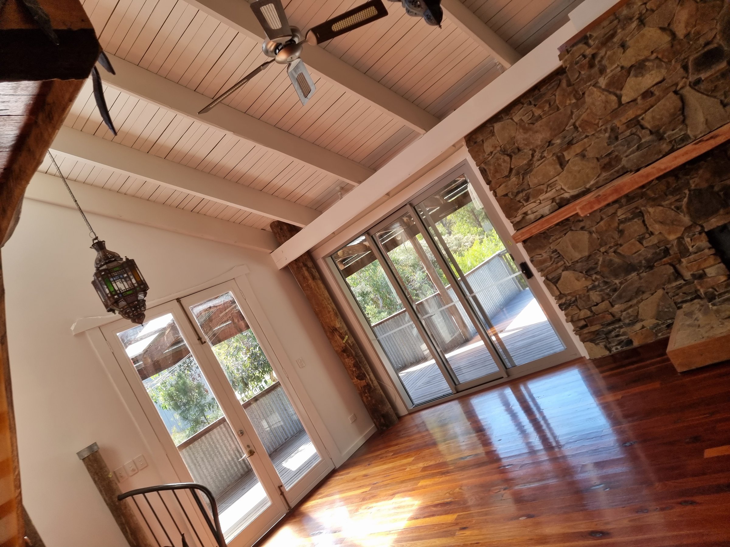 Family room transformation detail showing Quality Painting Group's professional work