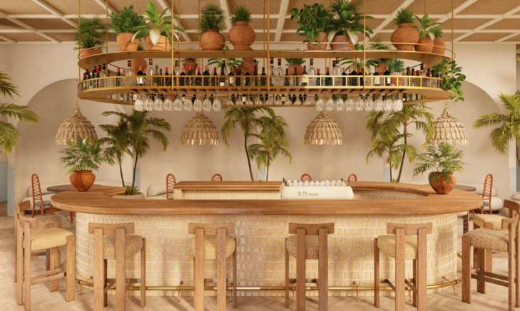 A stylish bar with tropical decor, featuring wooden furniture, hanging lights, potted plants, and a circular counter.