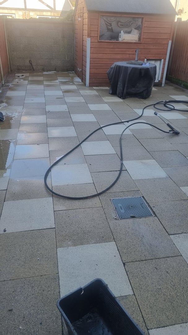 After pressure washing showing clean garden patio