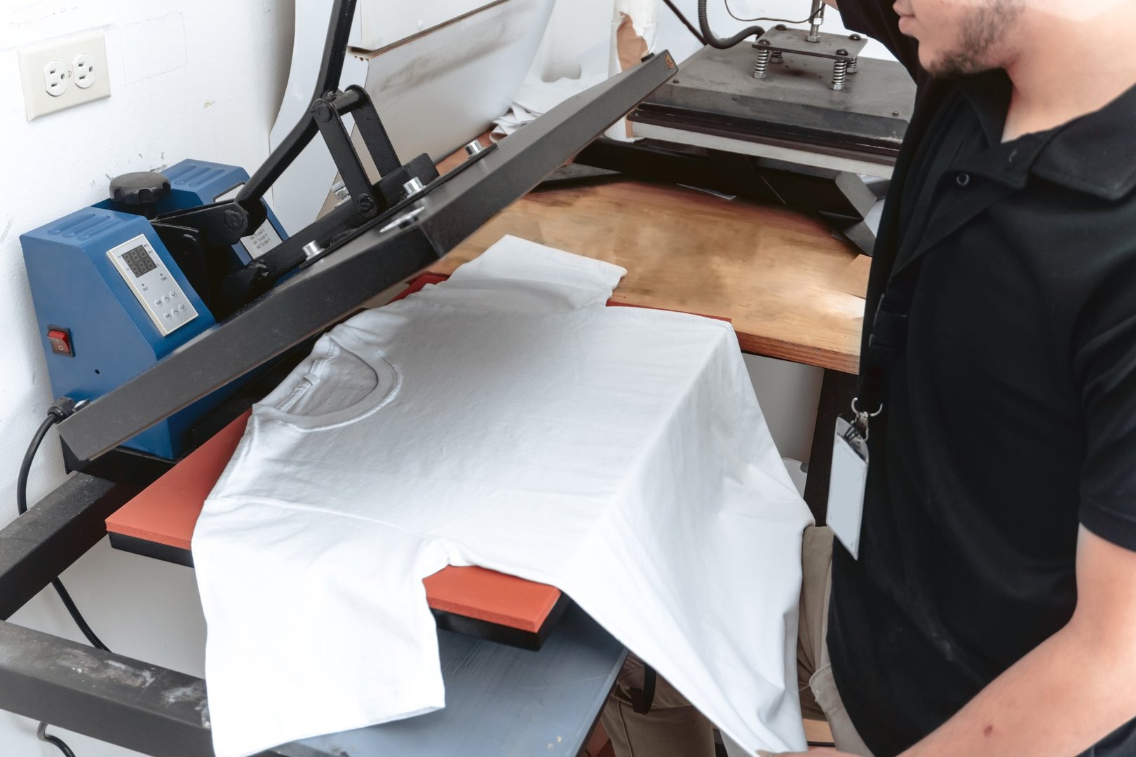 Person working on iron sublimation printing